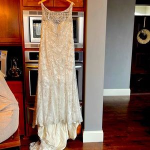 Stunning wedding dress. I never wore but purchased for 800